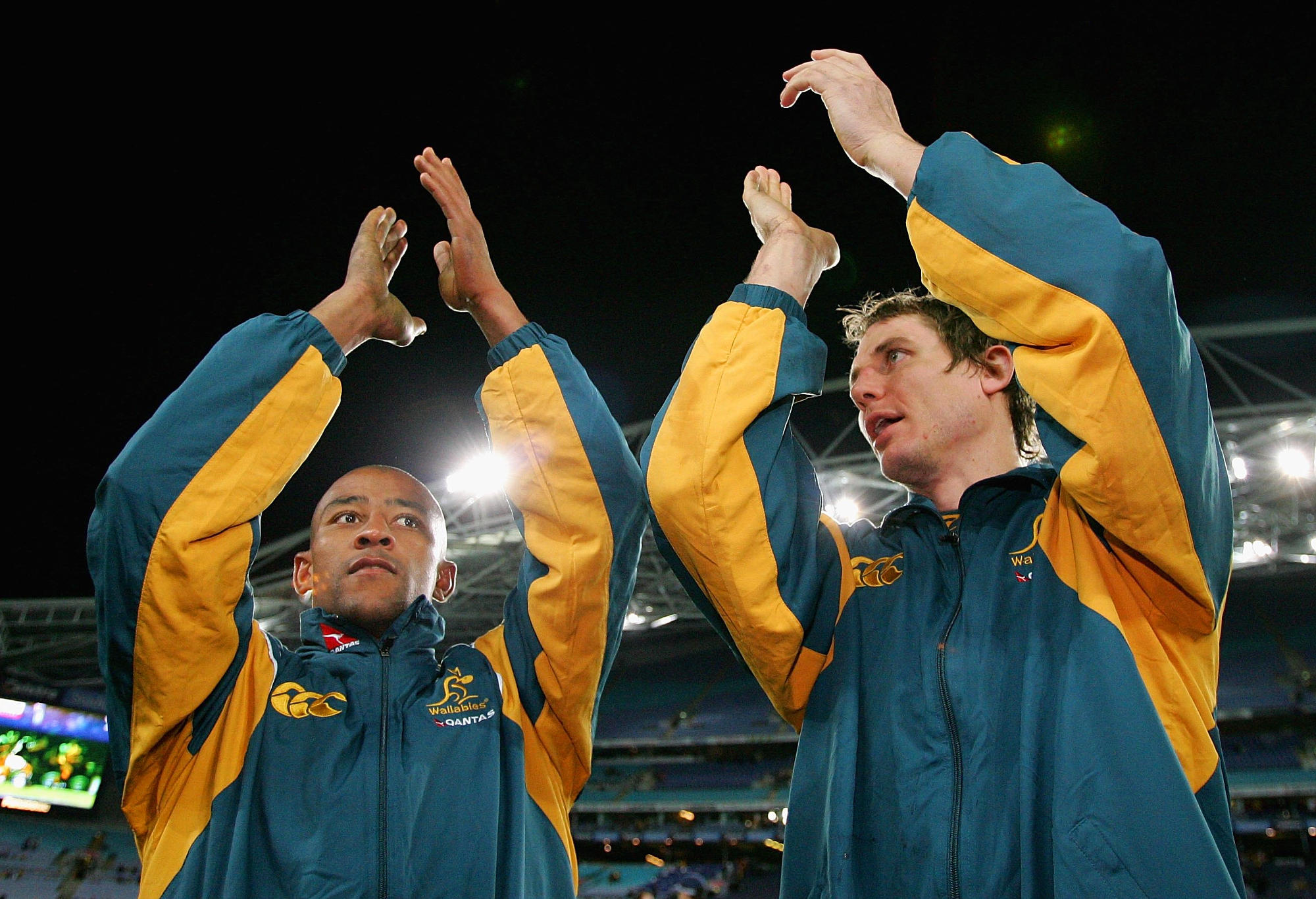 George Gregan and Stephen Larkham of the Wallabies thank fans
