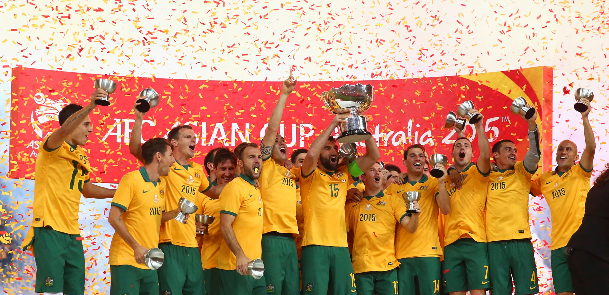 Australia celebrate with the trophy after the 2015 Asian Cup final match against Korea Republic.