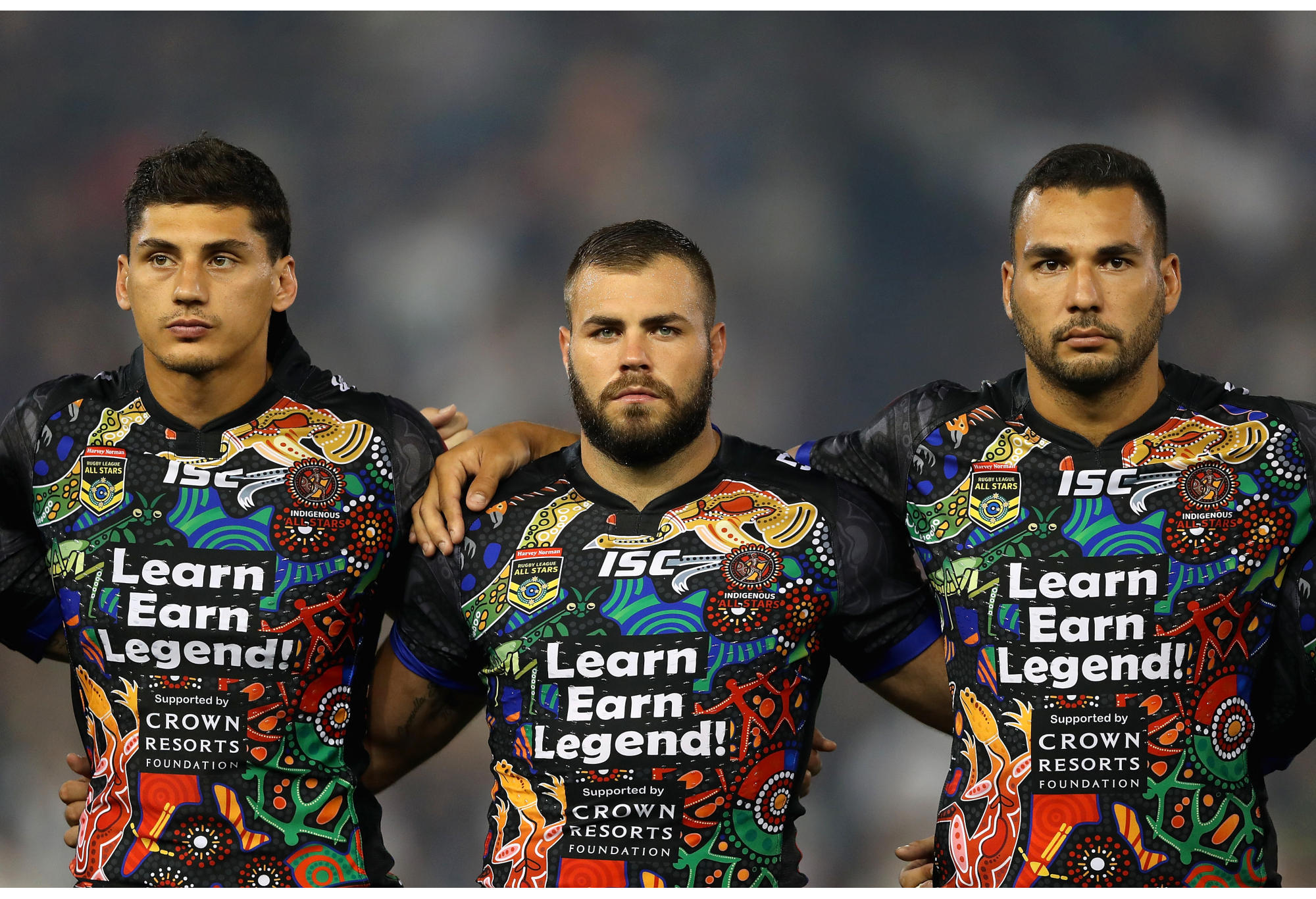 Kyle Turner, Wade Graham and Ryan James of Indigenous All Stars line up during the 2017 All Stars match.