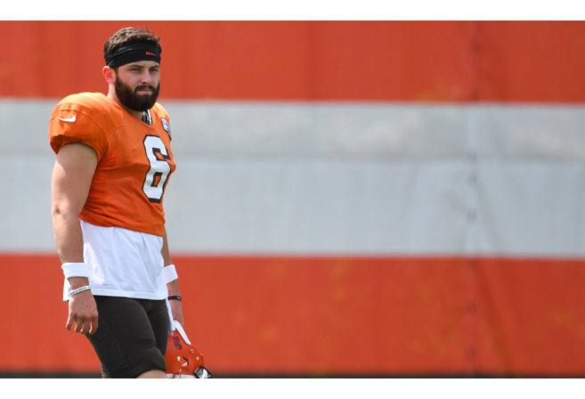 Quarterback Baker Mayfield of the Cleveland Browns walks onto the field during a training.