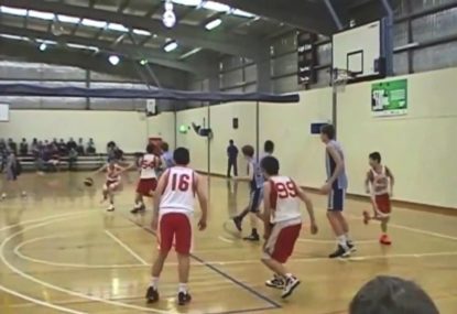 Young champ shows off his dribbling on the way to the hoop