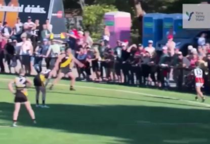 Forward drop punts from the boundary line and absolutely nails it