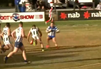 Local footy player nails opponent with crunching hip and shoulder