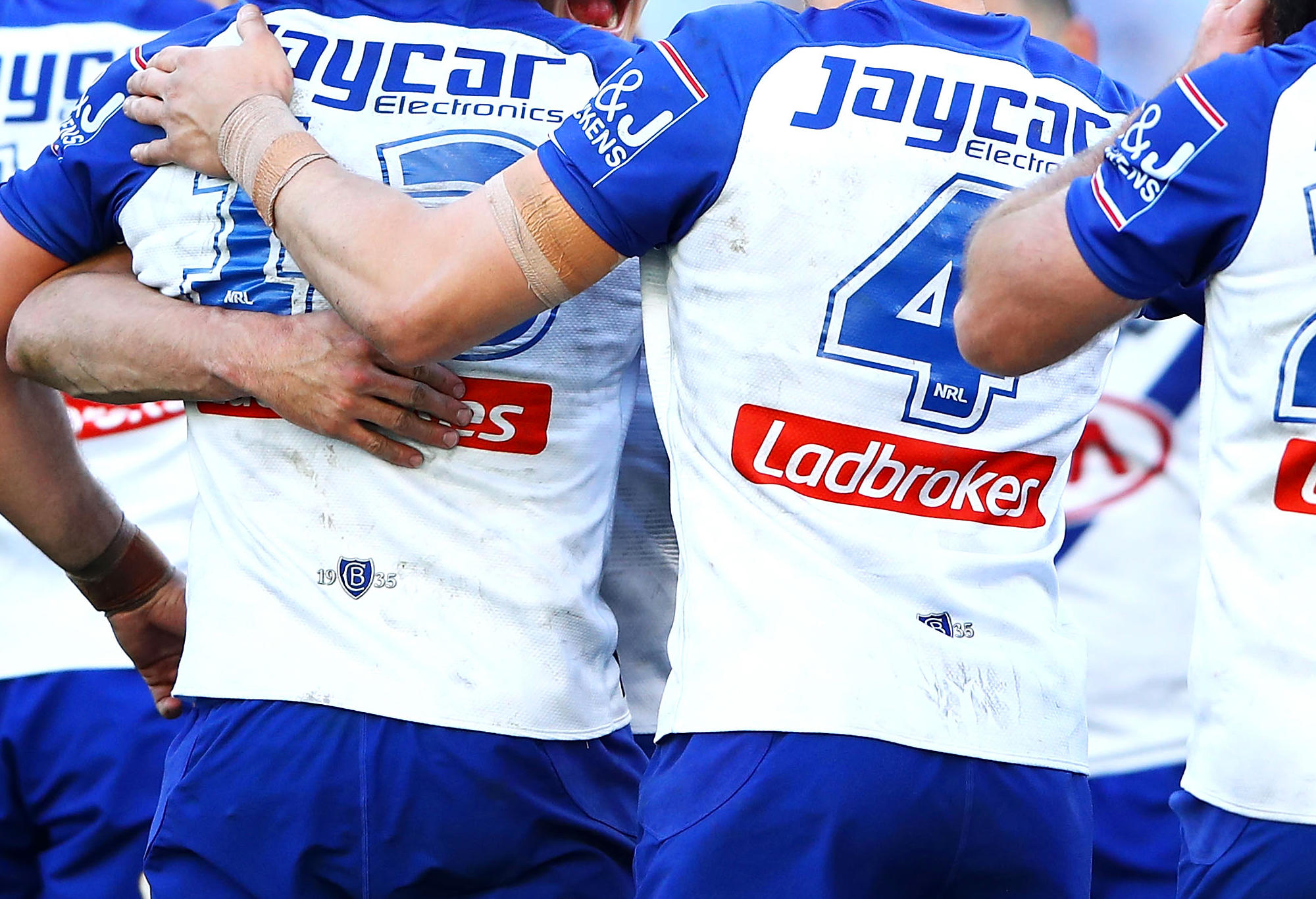 A generic photo of Canterbury Bulldogs NRL players celebrating a try.