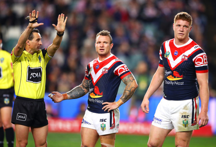 Referee Gerard Sutton gives Dylan Napa of the Roosters ten minutes in the sin bin.