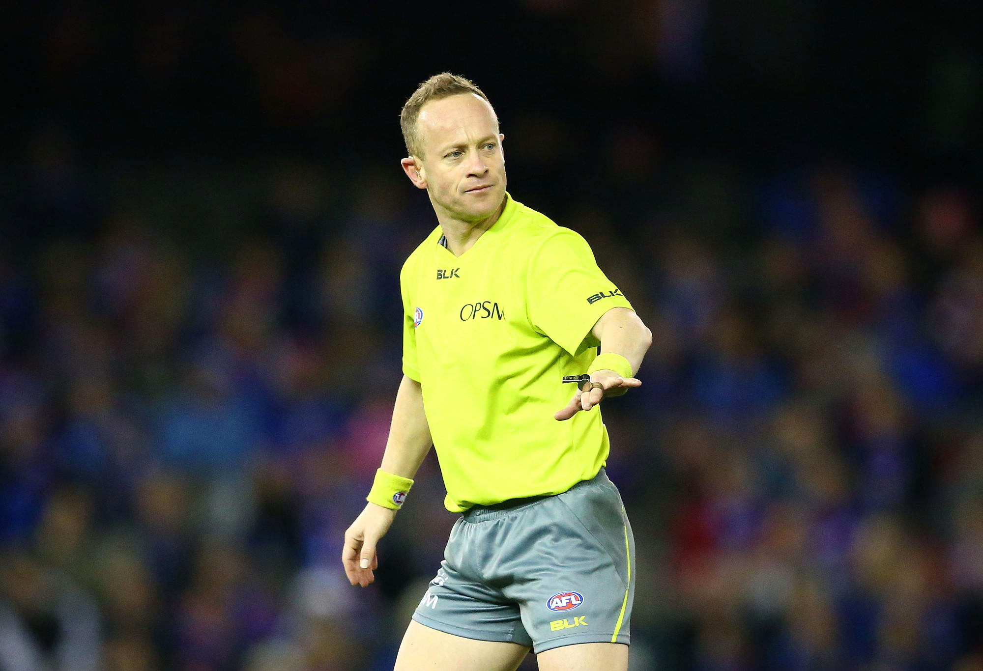Umpire Ray Chamberlain gestures during the round 18 AFL match between the Western Bulldogs and the St Kilda Saints at Etihad Stadium on July 23, 2016 in Melbourne, Australia.