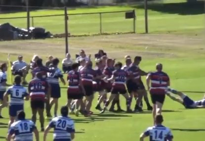 Footy game erupts into all-in MELEE after massive one-on-one hit