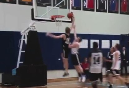 One handed dunk ends up square on the shooter's head!