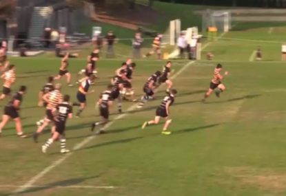 Local star sells dummy to foolish defence for long-range try