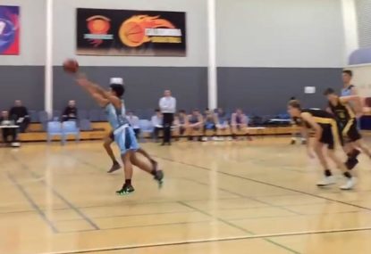 Insane steal and buzzer-beating half-court shot... from a kid!