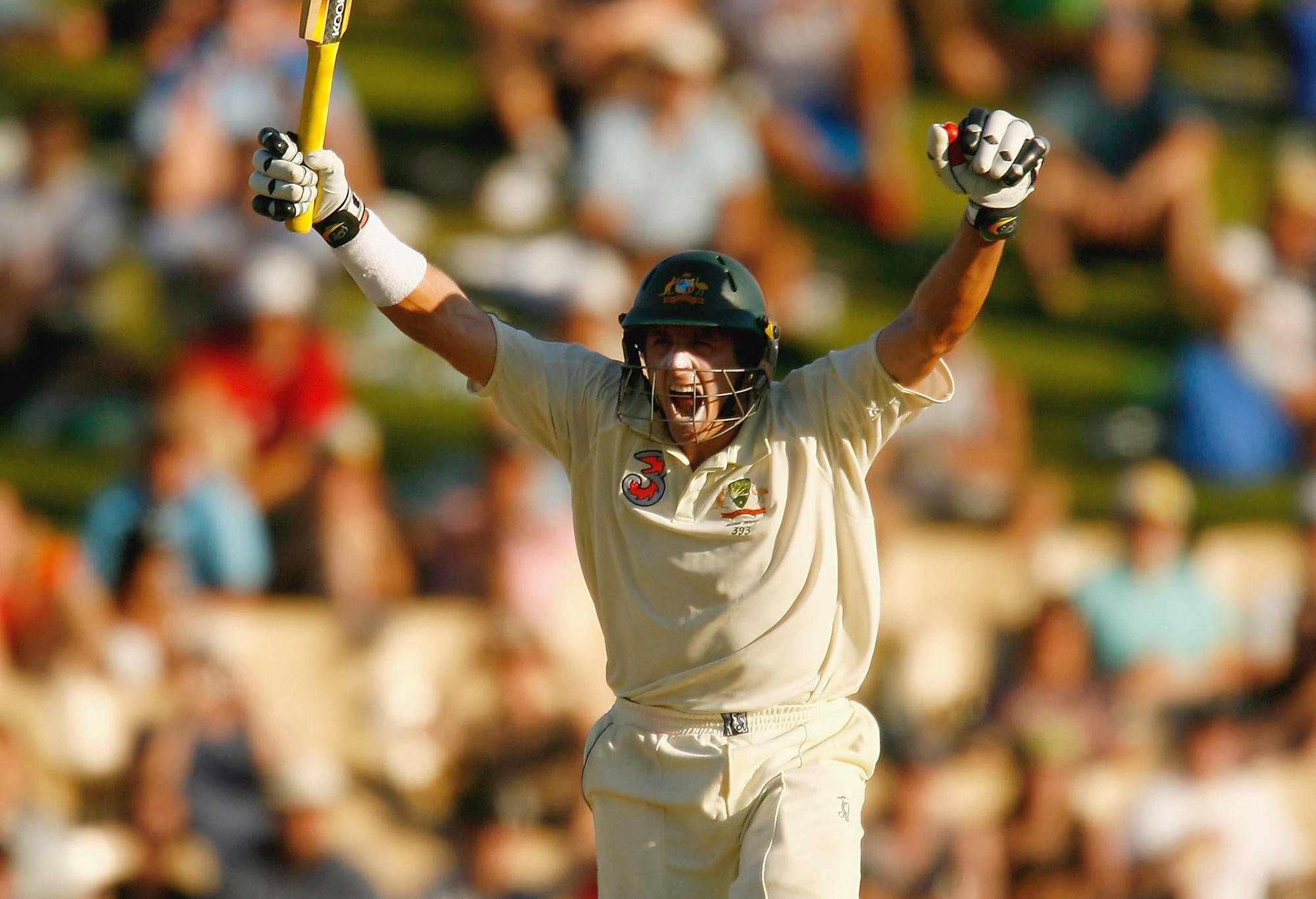 Michael Hussey of Australia celebrates scoring the winning runs