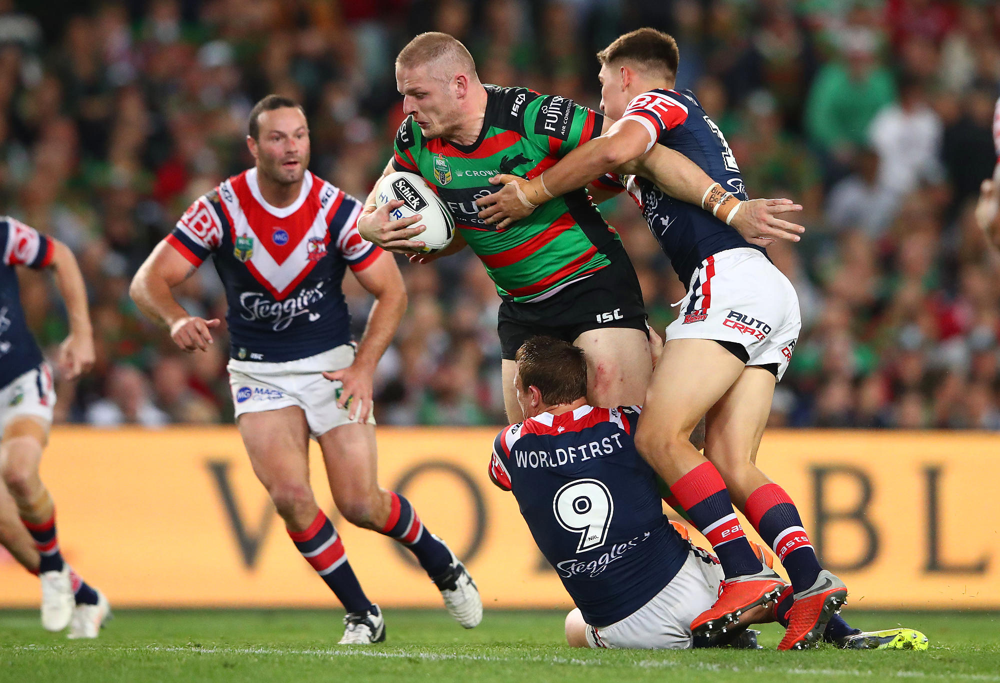 George Burgess of the Rabbitohs is tackled during the NRL Preliminary Final match between the Sydney Roosters and the South Sydney Rabbitohs at Allianz Stadium on September 22, 2018 in Sydney, Australia.