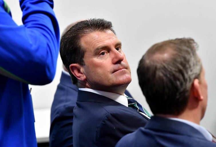 Mark Taylor looks up at a meeting