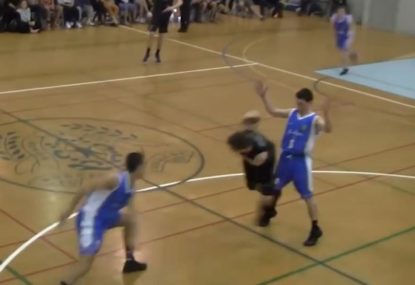 Miraculous no-look pass prevents certain foul and sets up unlikely basket
