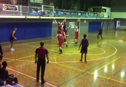 Freakish basketballer breaks through wall of defence to score amazing bucket