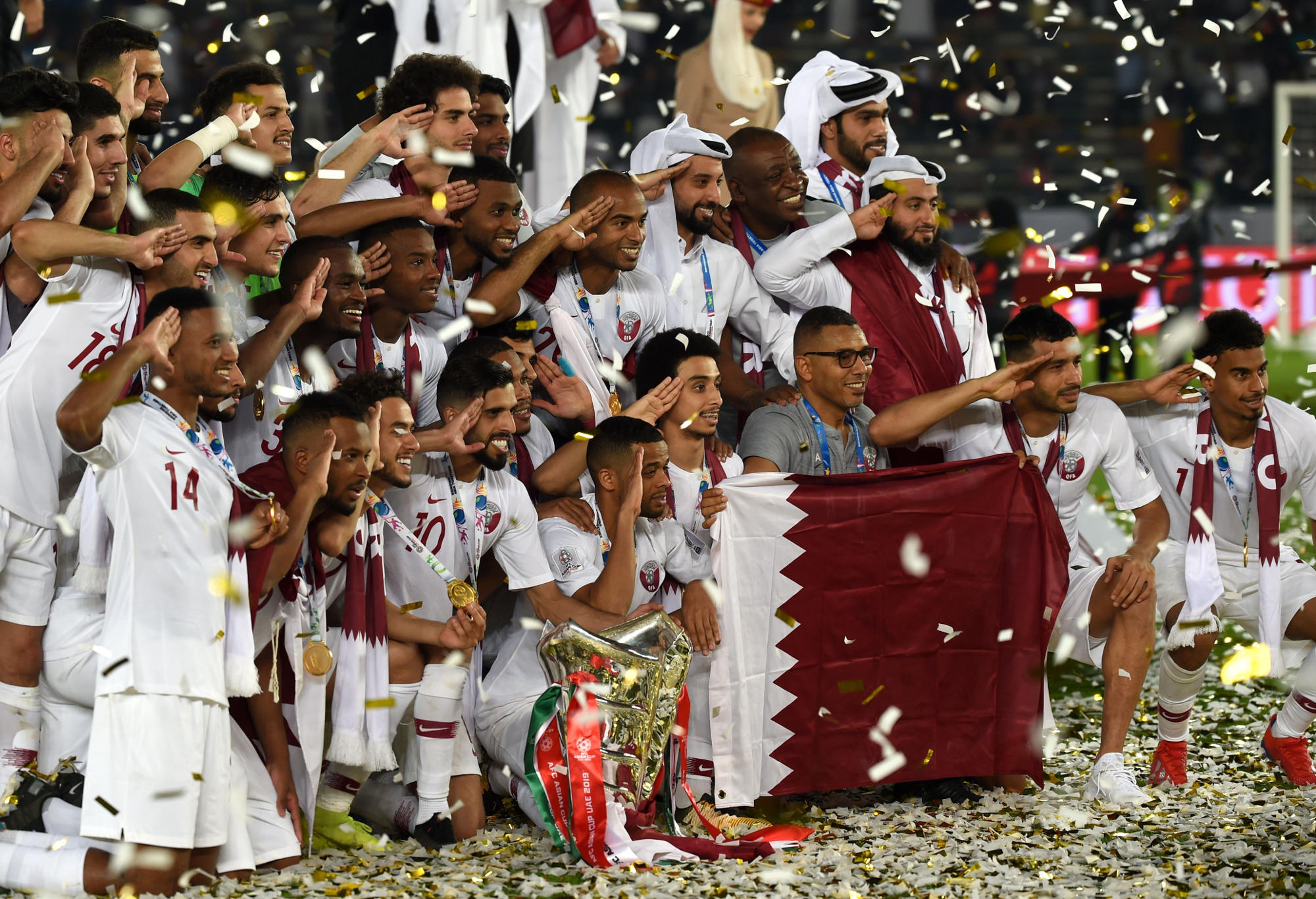 Qatar players celebrate their Asian Cup win.