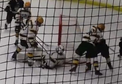 Goalie's hilariously odd save laying on puck with his back!