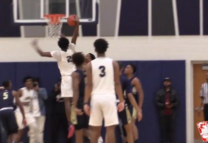Fearsome high school basketballer slams down huge one-handed dunk