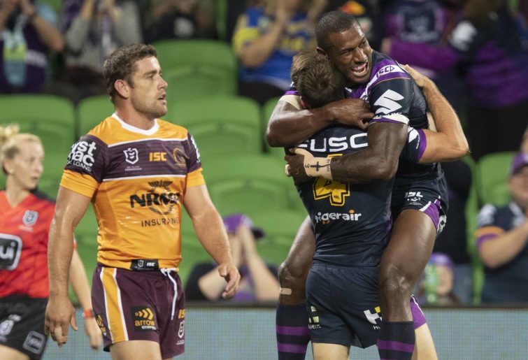 Curtis Scott of the Storm celebrates a try