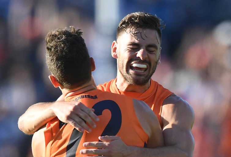 Stephen Coniglio (right) and Josh Kelly of the Giants