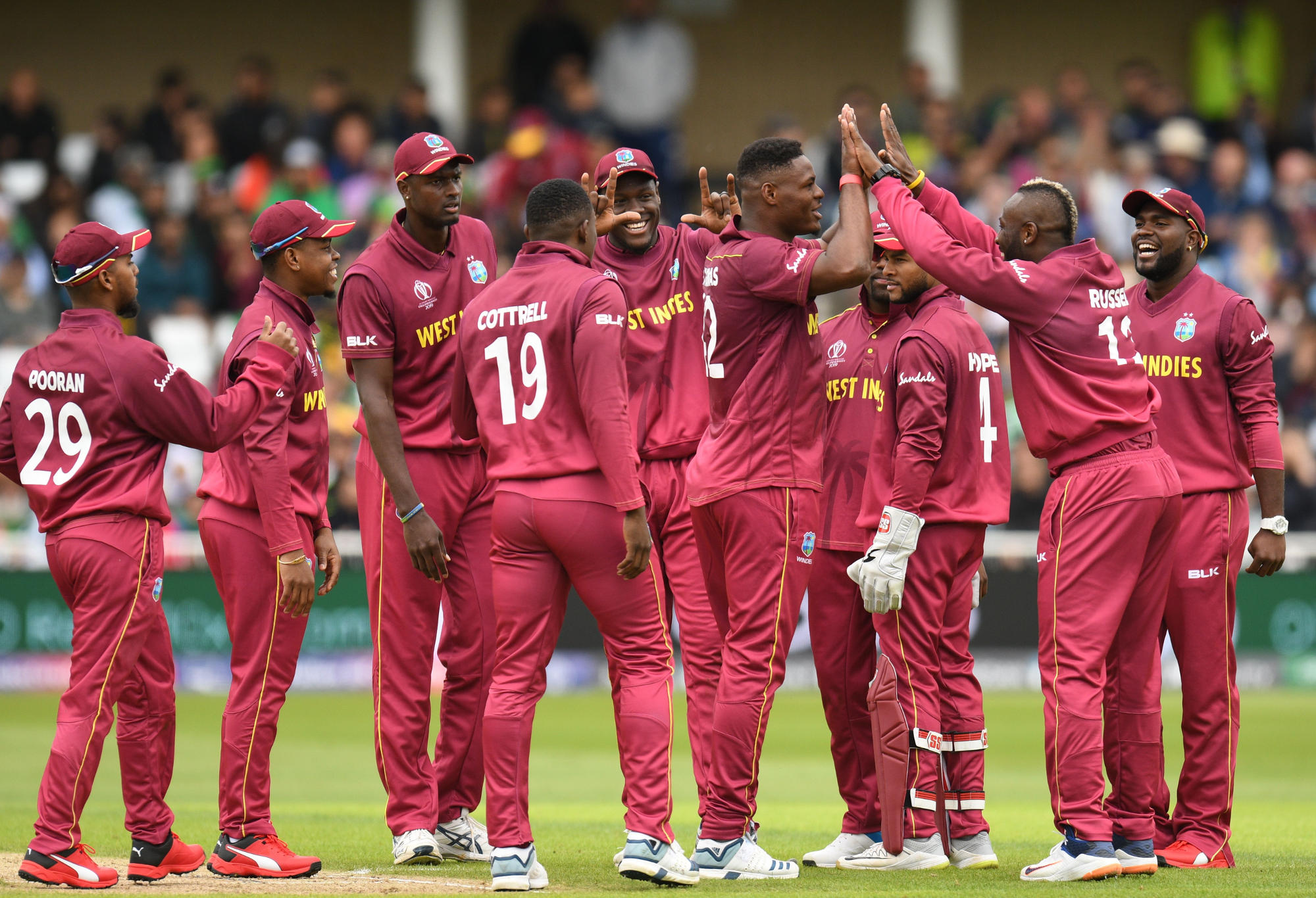 The West Indies celebrate a wicket at the Cricket World Cup.