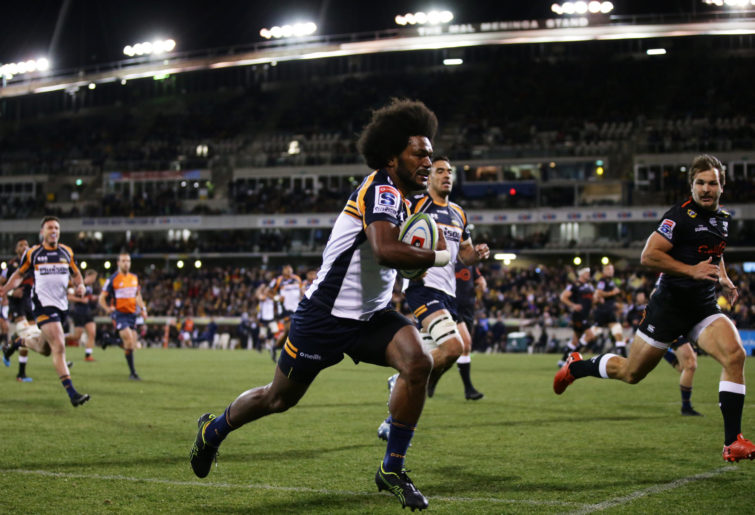 Henry Speight runs the ball for the Brumbies.