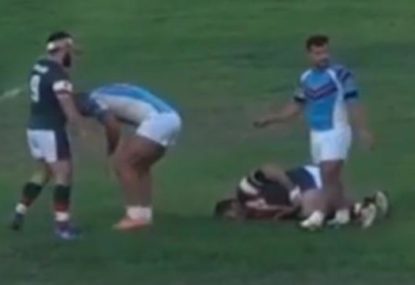 Unlucky tackler cops a knee to the family jewels