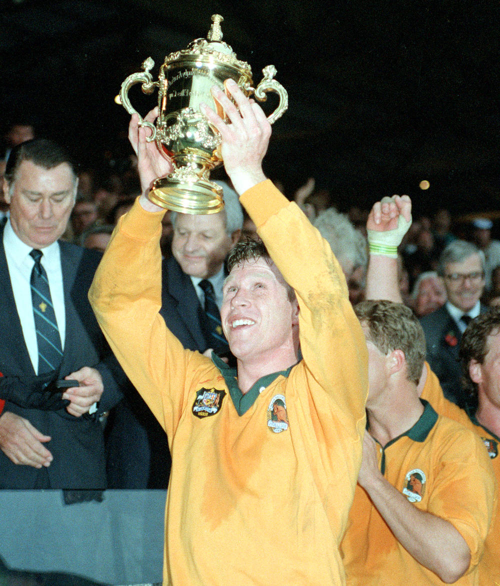 Nick Farr-Jones celebrates with the Rugby World Cup Trophy