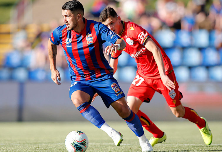Dimi Petratos of the Newcastle Jets dribbling during Round 3 A-League