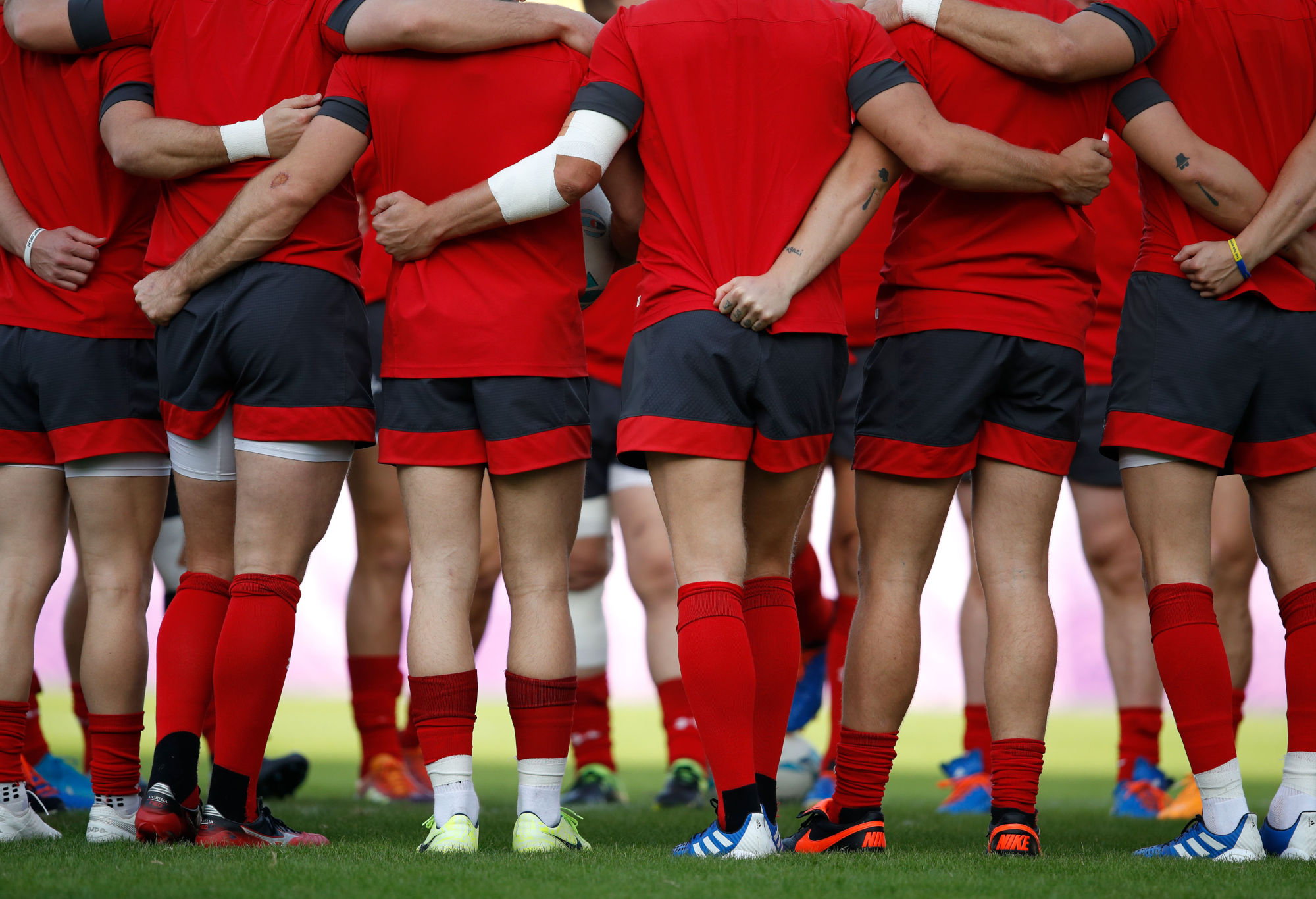 Wales players in a huddle