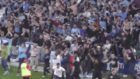 Sydney FC fans storm pitch following derby winner