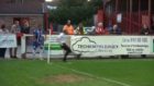 Fan runs onto pitch and takes corner kick