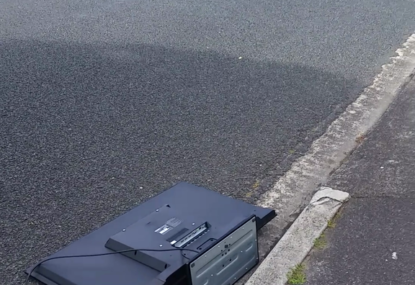 Disappointed rugby fan throws his TV to the kerb