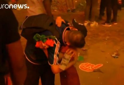 Young Portuguese fan comforts heartbroken French supporter after Euro loss