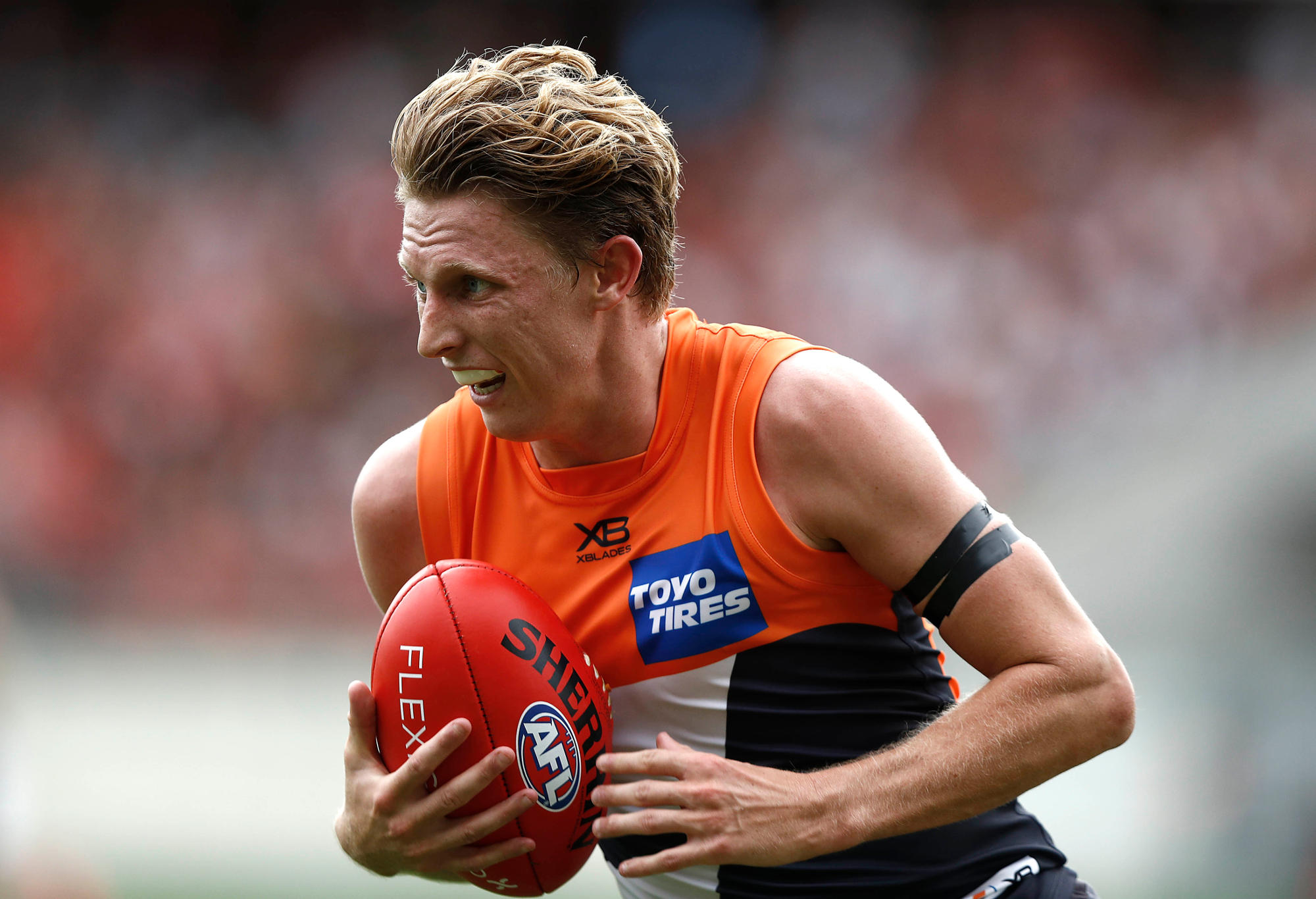Lachie Whitfield of the GWS Giants carries the ball.