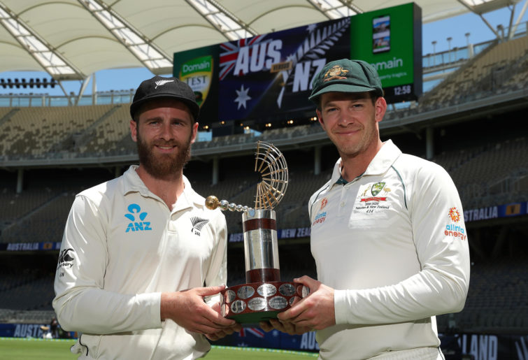Kane Williamson of New Zealand and Tim Paine of Australia pose with the Trans-Tasman trophy