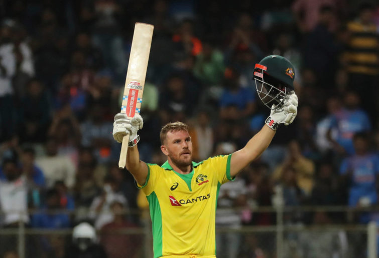 Australiaand#039;s captain Aaron Finch celebrates after scoring a hundred