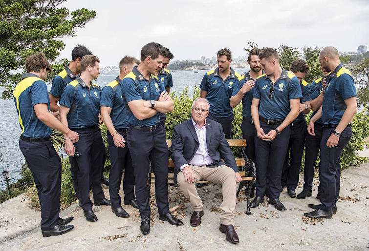 Scott Morrison surrounded by the Australian cricket team