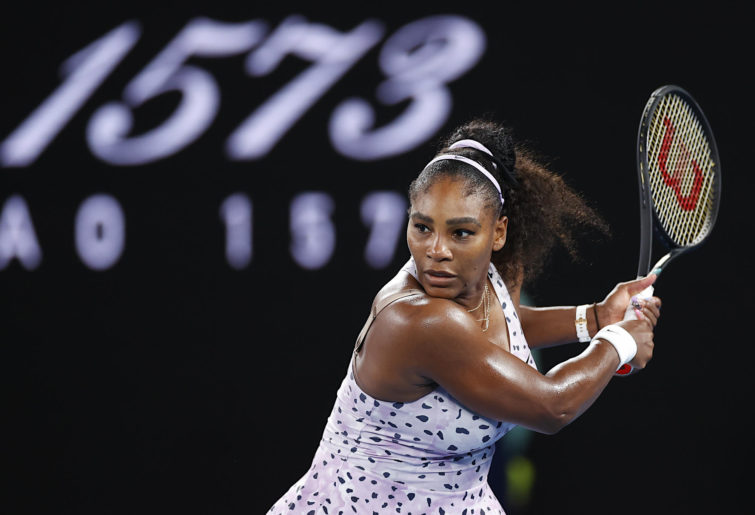 Serena Williams plays a backhand