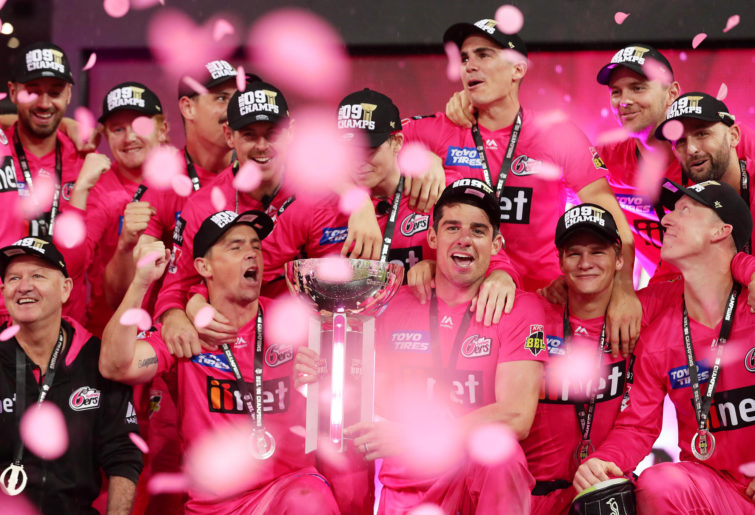 The Sixers pose with the trophy after winning the Big Bash League Final