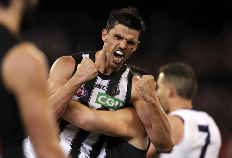 Scott Pendlebury of the Magpies celebrates a win