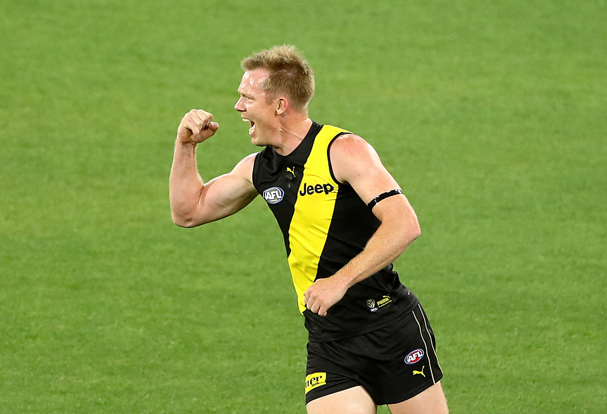 Jack Riewoldt of the Tigers celebrates kicking a goal