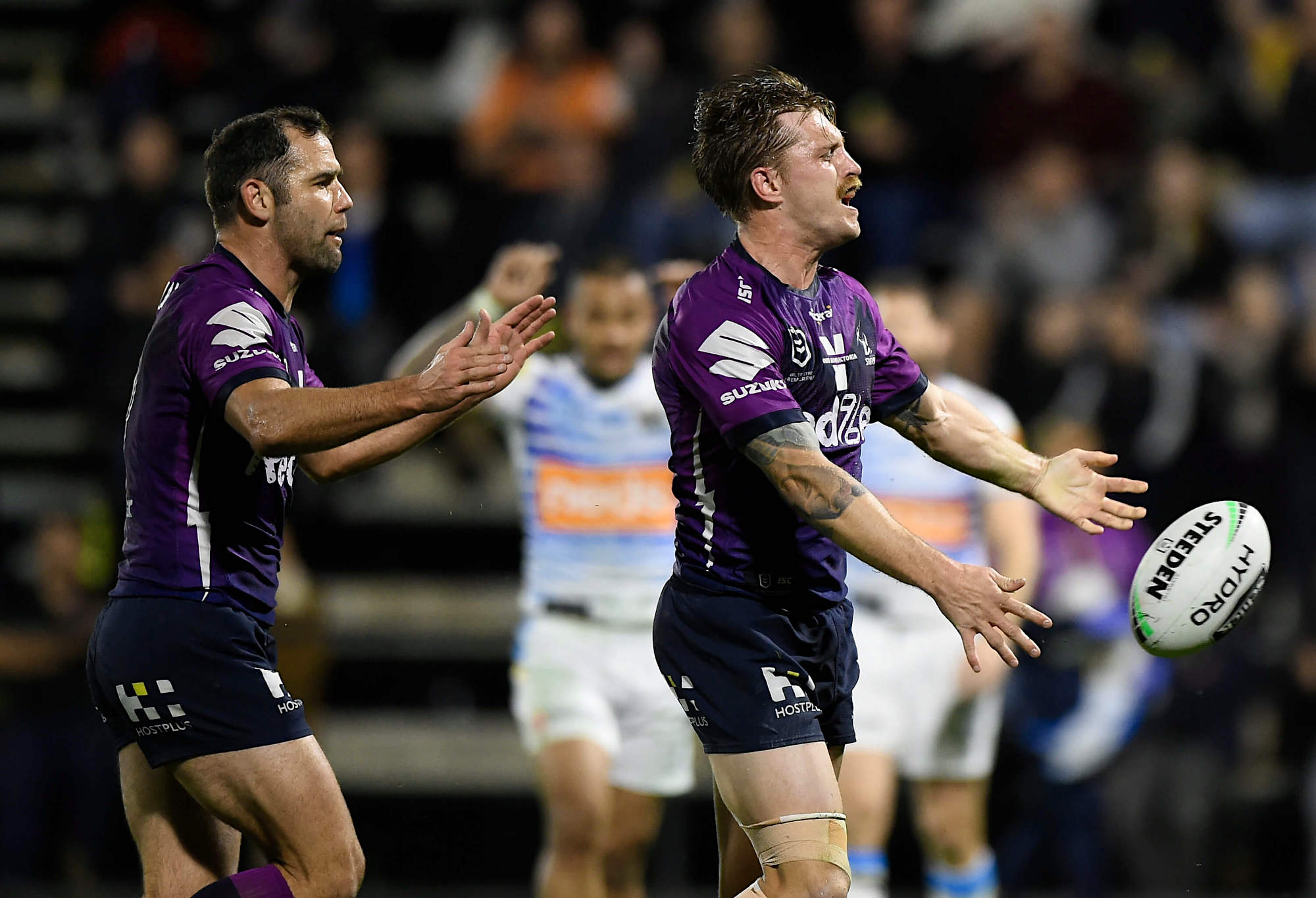 Cameron Munster and Cameron Smith celebrate a try