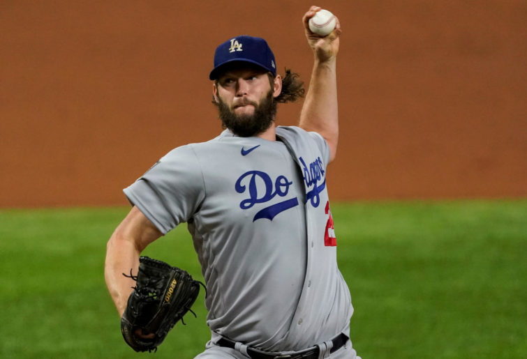 Clayton Kershaw #22 of the Los Angeles Dodgers pitches during Game 5 of the 2020 World Series