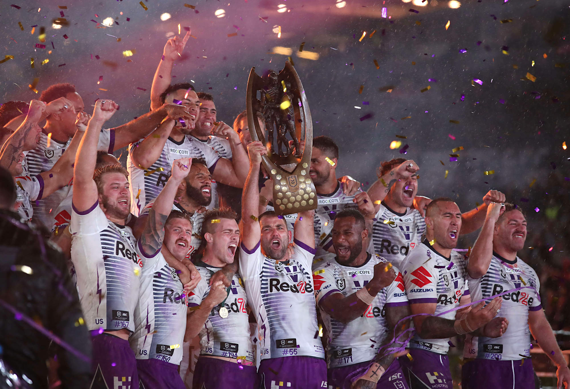 Cameron Smith of the Storm lifts the Premiership Trophy