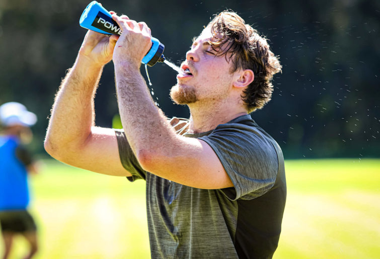 Fraser McReight of the Wallabies drinks water at training