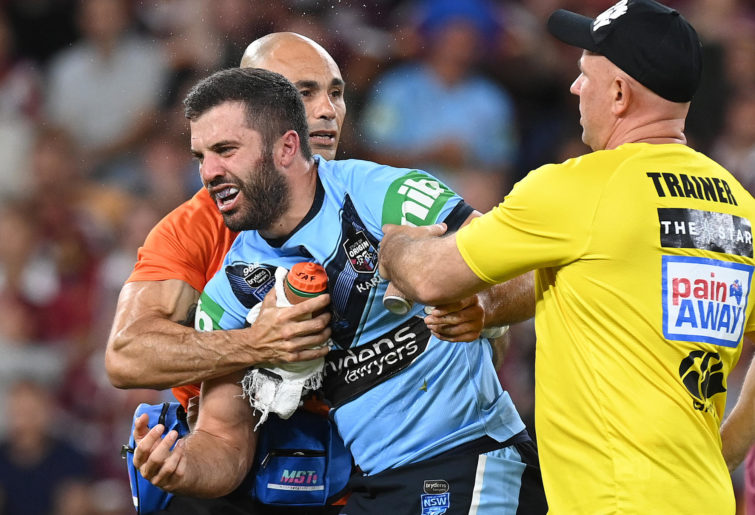 James Tedesco of the Blues is seen after he collided with an opponent during game three of the State of Origin series
