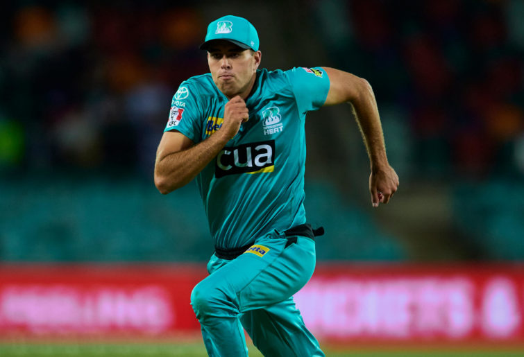 Xavier Bartlett of the Heat fields the ball during the Big Bash League