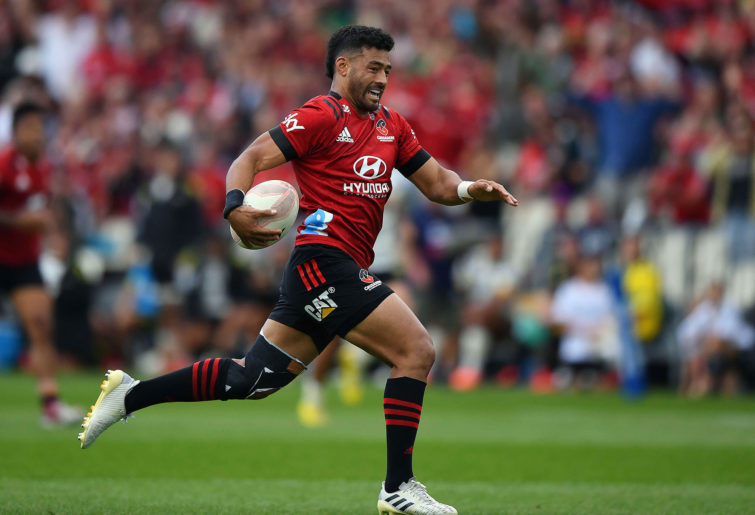 Richie Mo'unga of the Crusaders runs through to score a try