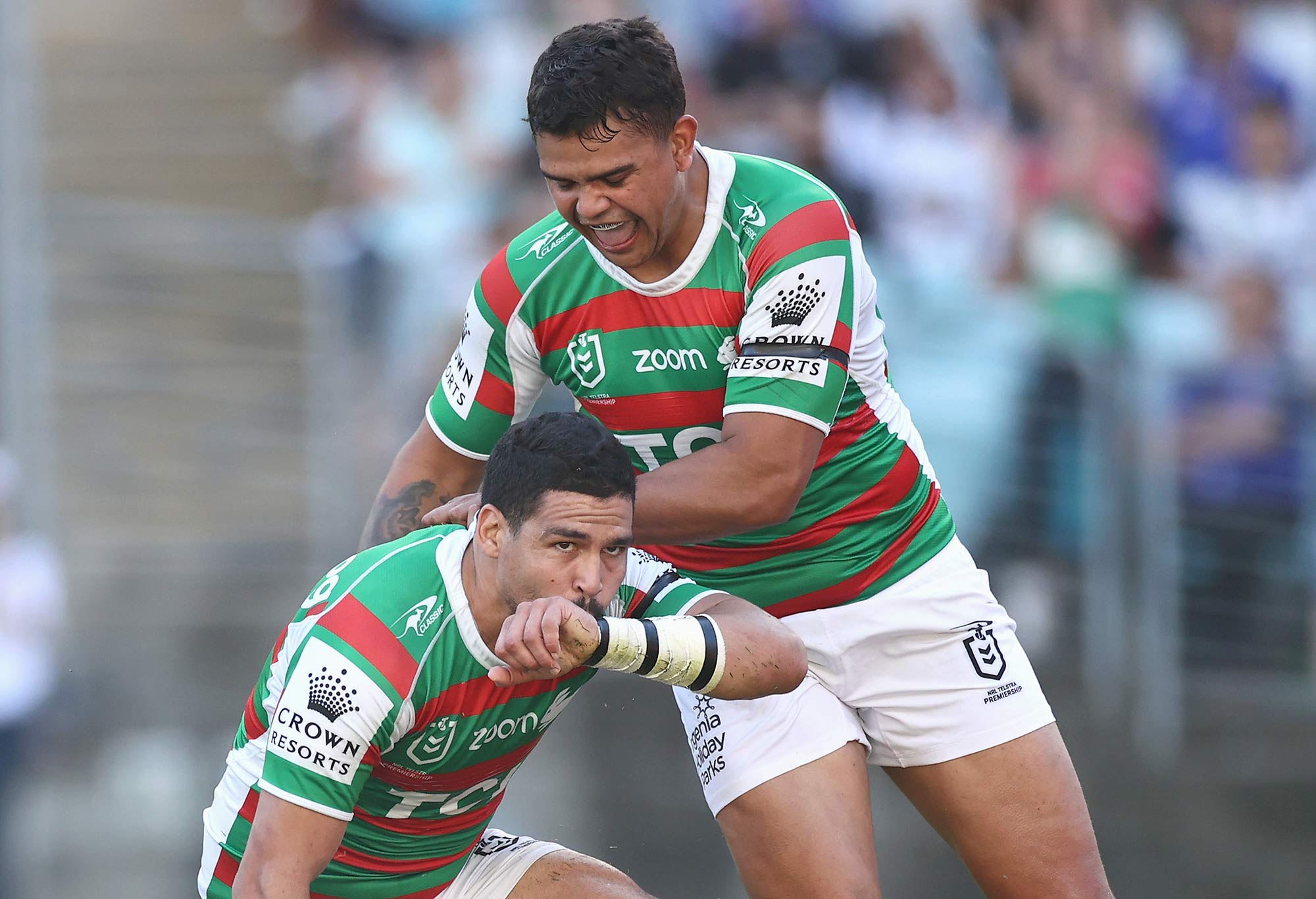 Cody Walker of the Rabbitohs celebrates scoring a try with Latrell Mitchell